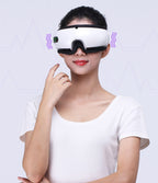 Rechargeable heated eye massager