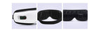 Heated eye massager in use